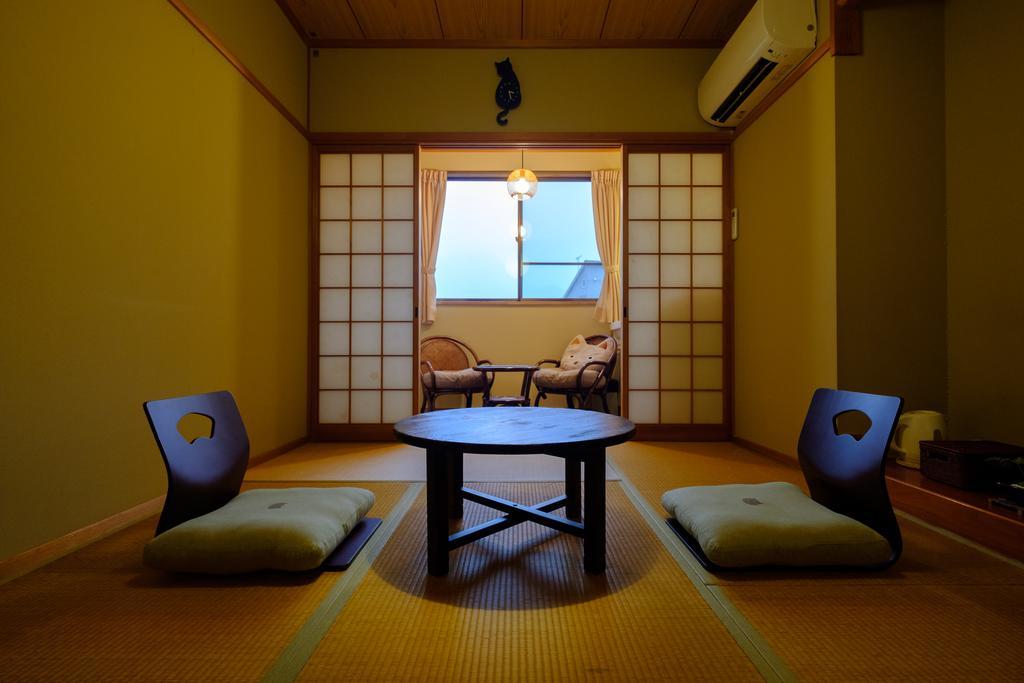 Hotel Waraneko No Yado Yufu Habitación foto